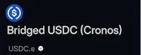 the bridged usdc cronos logo on a black background